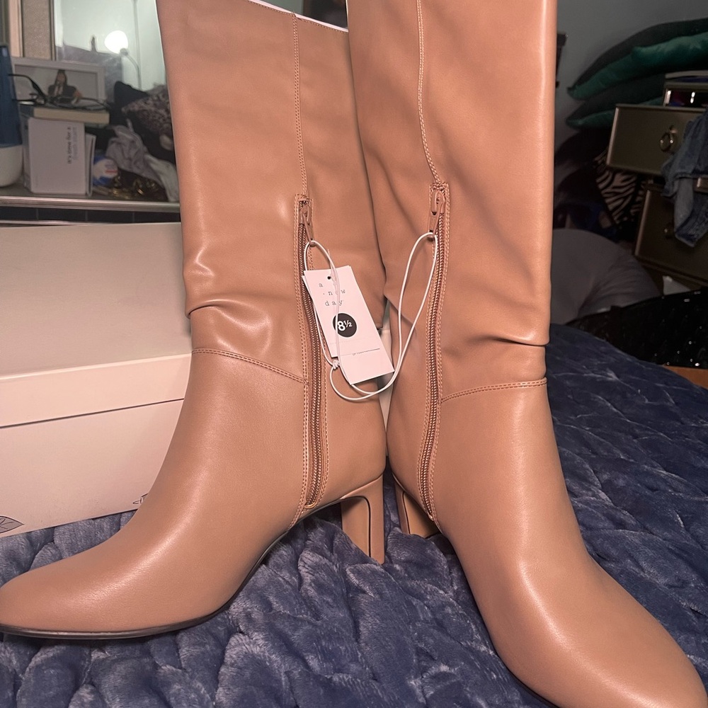 Tan Heeled Boots with Sleek Design and Zipper